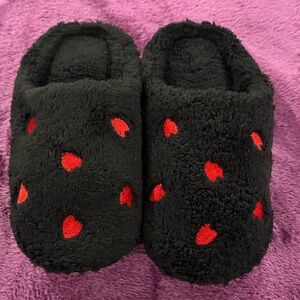 Black with red hearts house slippers! Non skid sole. Super soft! New in package